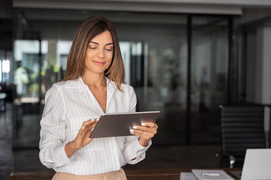 Woman using a tablet in an office